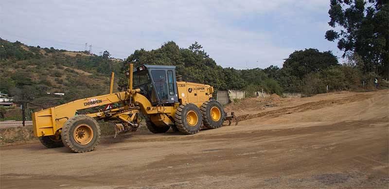 Grading the soil for sub-layer construction